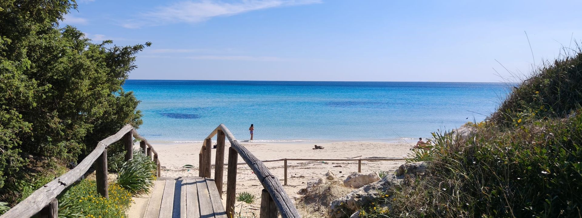 Passerella in legno verso la spiaggia di Punta Prosciutto